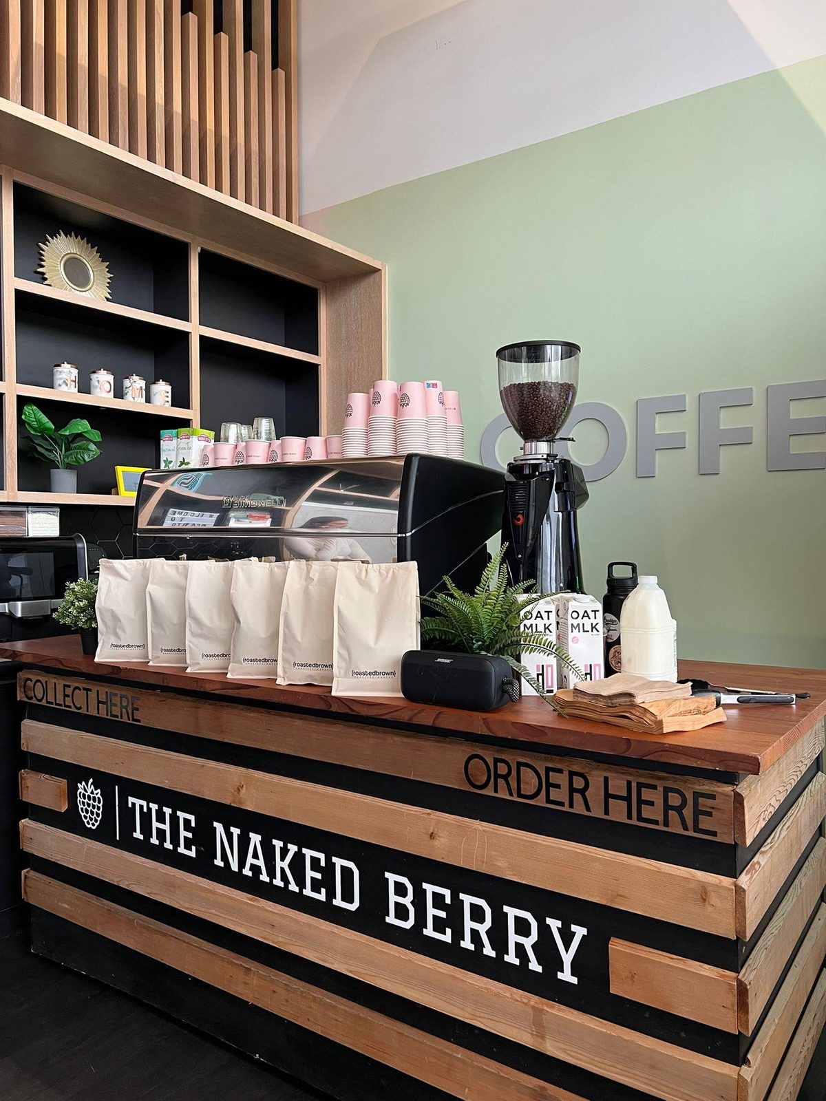 The Naked Berry Coffee Bar counter set up indoors