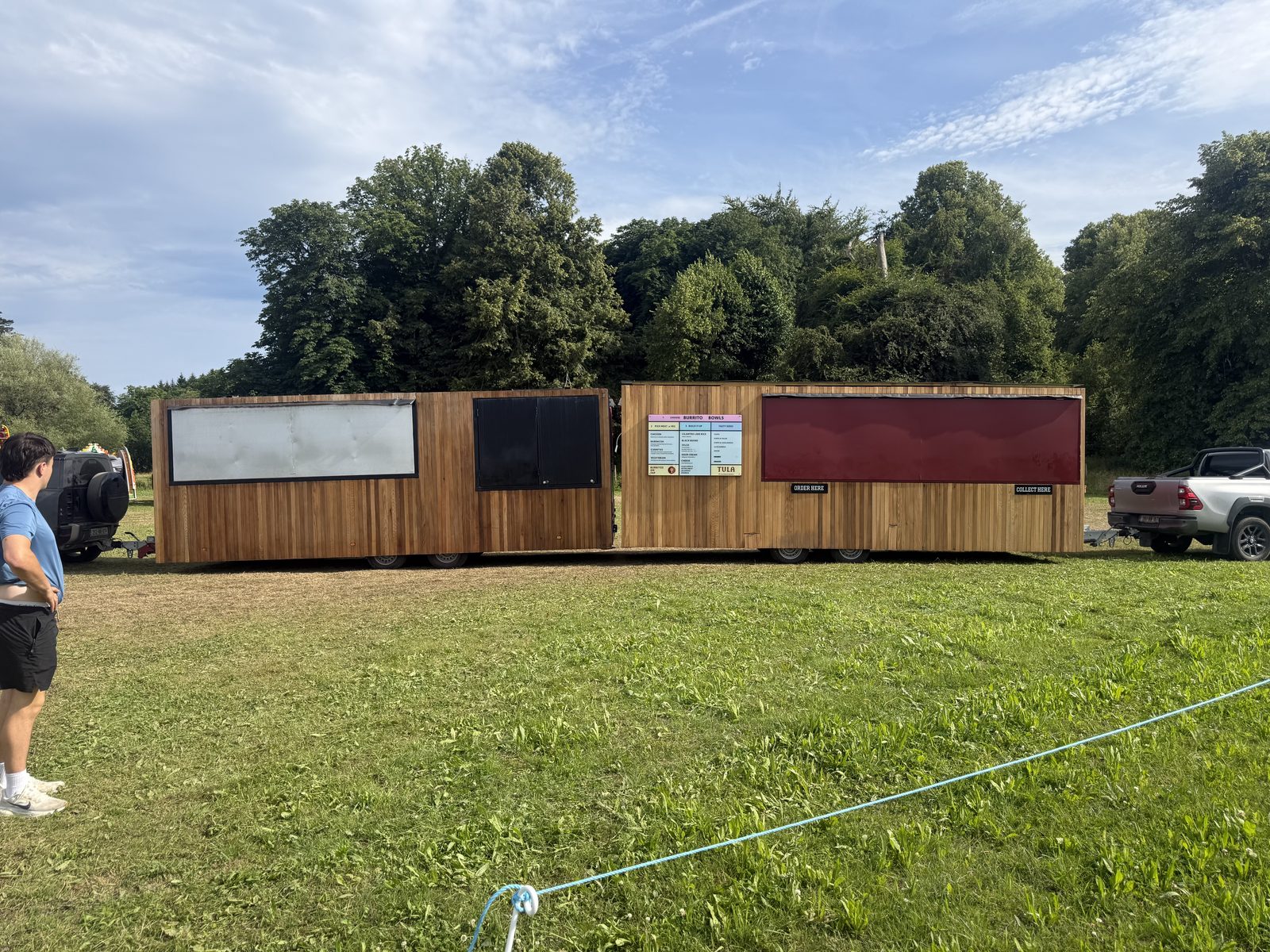 Naked Berry units set up in a field before an event