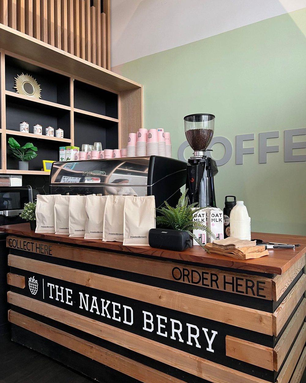 The Naked Berry Coffee Bar timber counter with espresso machine